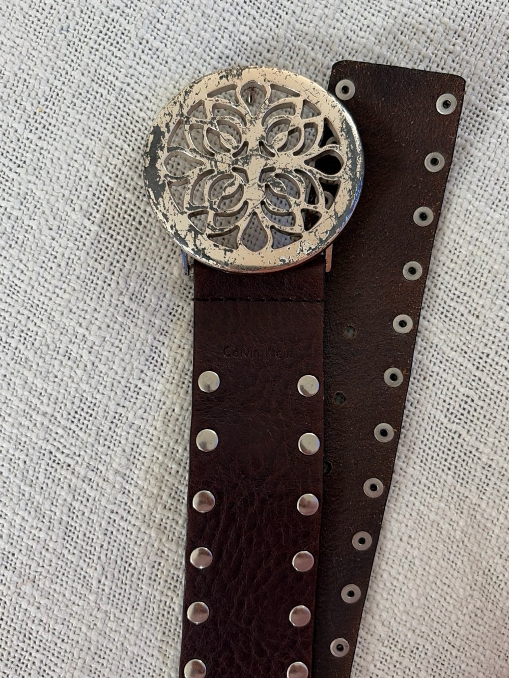 Calvin Klein Dark Brown Leather Belt with Ornate Silver Medallion Buckle